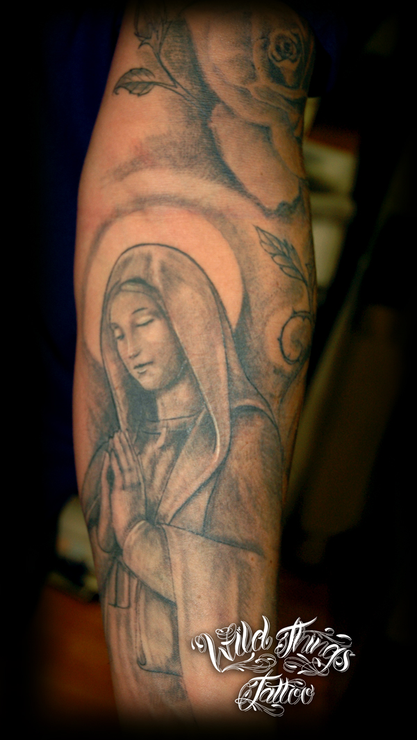 religious half sleeve tattoos forearm