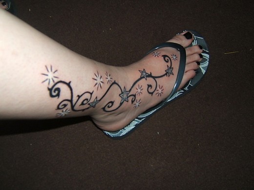 A Roundup of Reliable Foot Tattoo Designs - TutorialChip